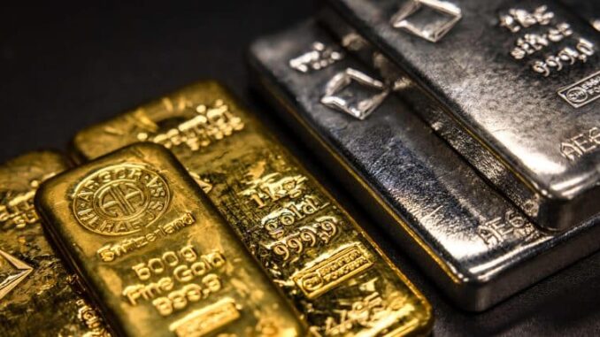 Gold and silver slide after record highs as profit-taking hits metals and markets